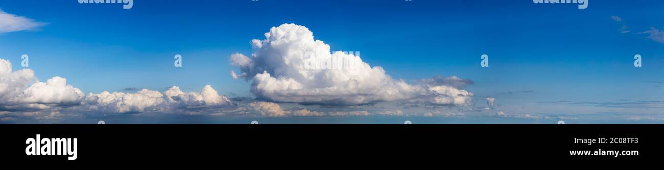 Panoramic View of Puffy White Clouds with Blue Sky Stock Photo - Alamy