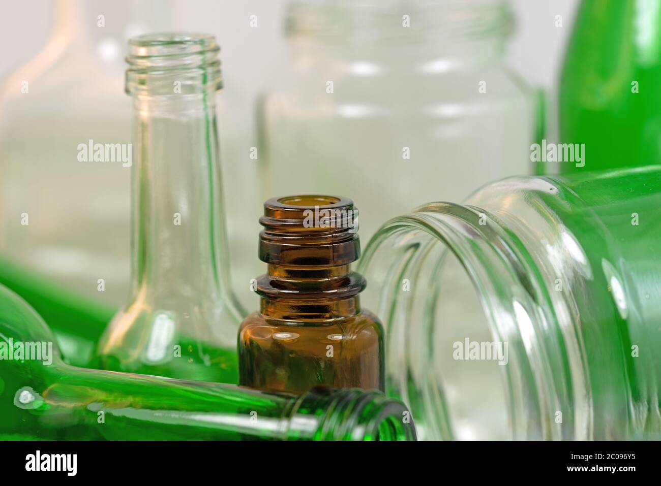 Old empty bottles and glasses for recycling Stock Photo