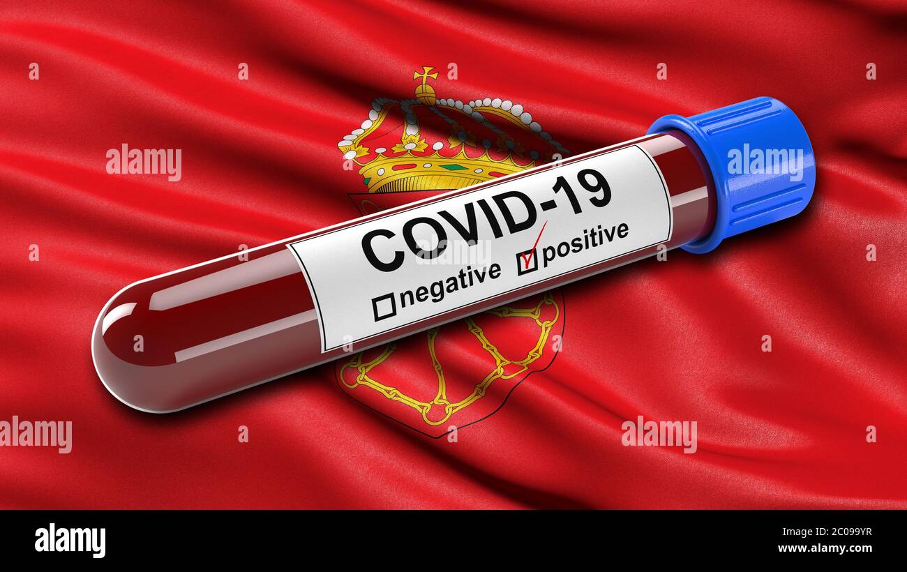 Flag of the Chartered Community of Navarre waving in the wind with a positive Covid-19 blood test tube. Stock Photo