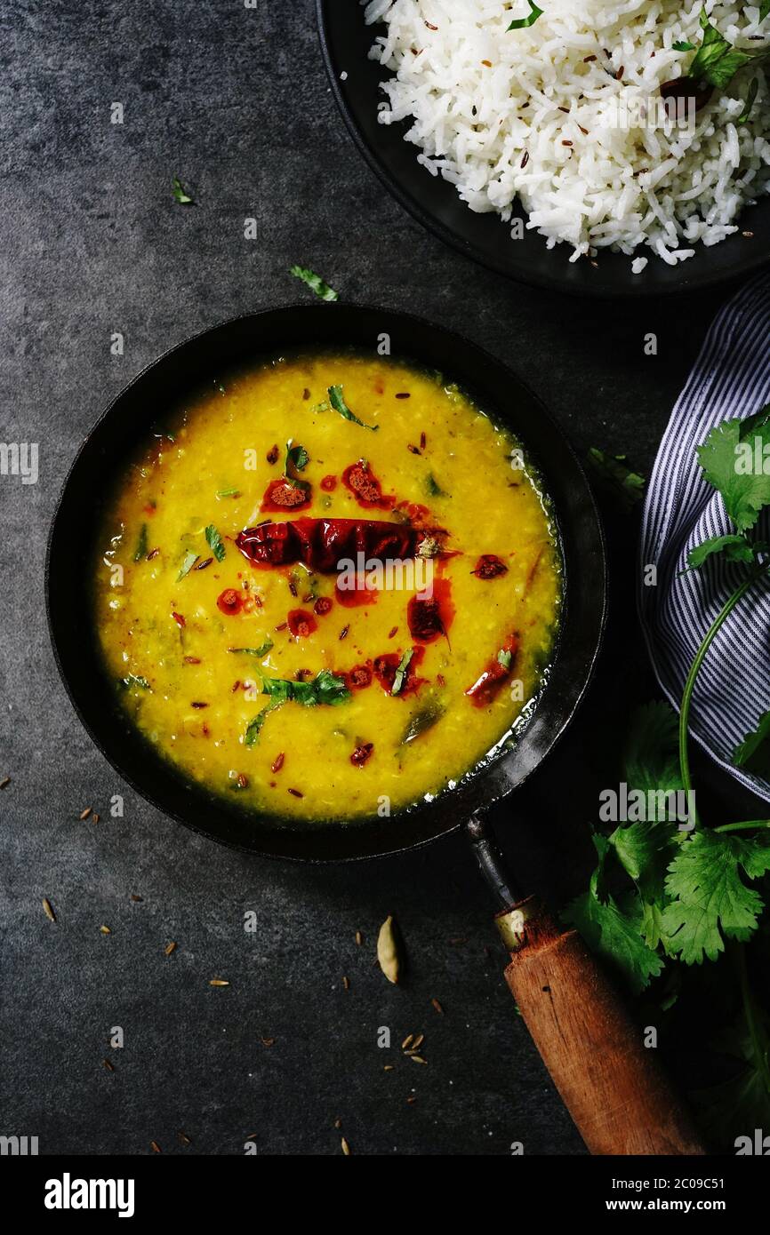 Dal Tadka /Daal fry-Indian lentil curry with Jeera rice Stock Photo