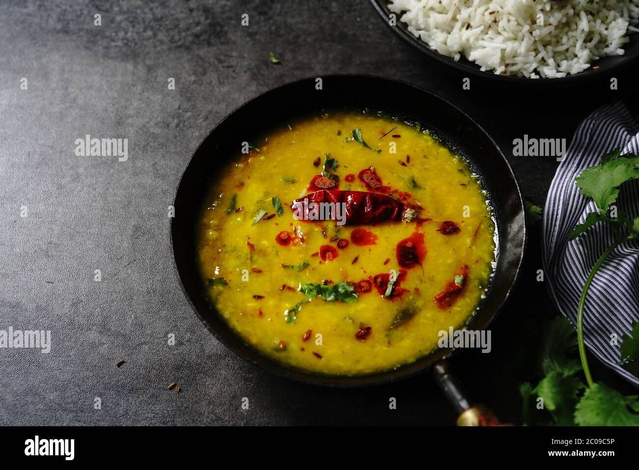 Dal Tadka /Daal fry-Indian lentil curry with Jeera rice Stock Photo