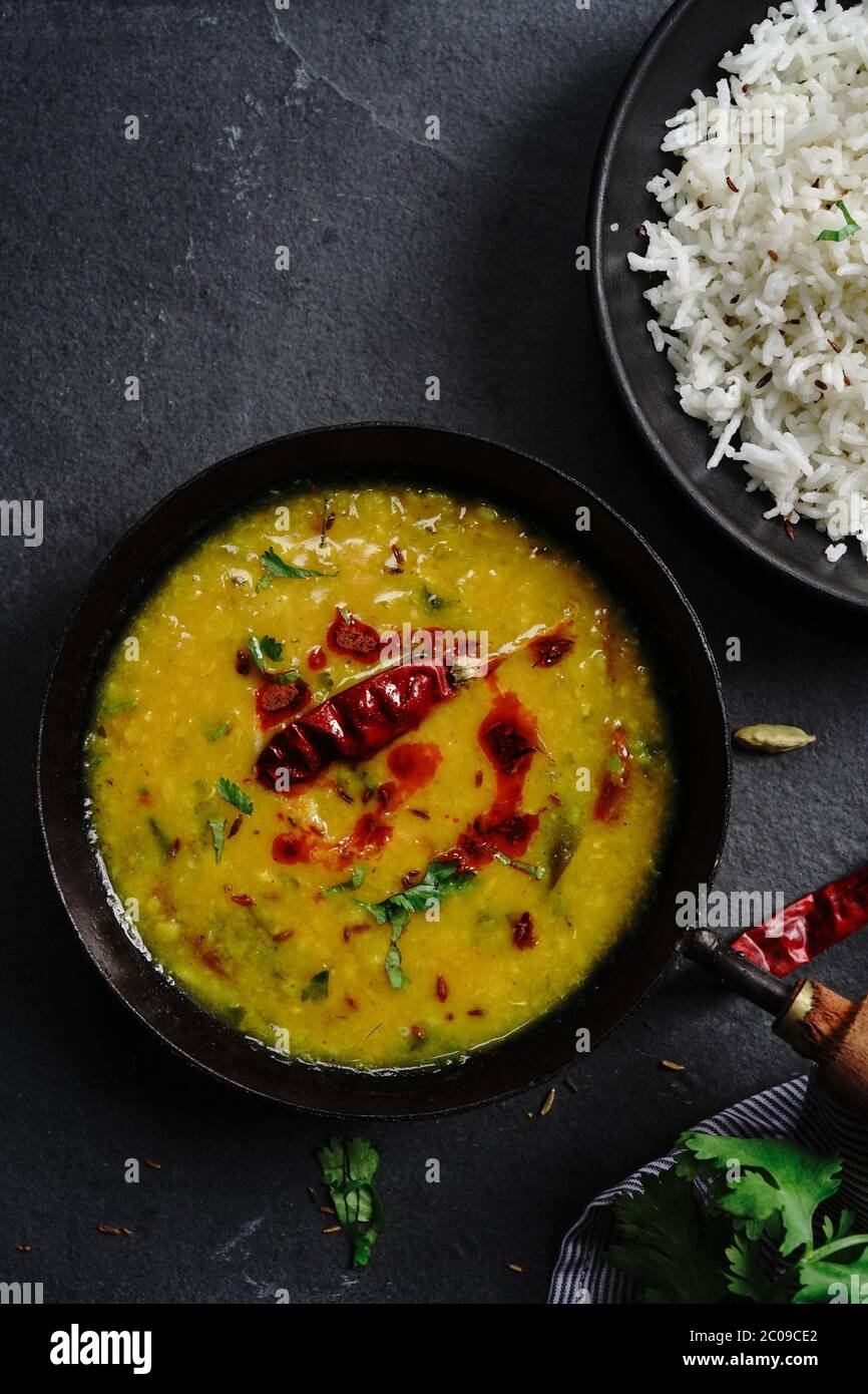 Dal Tadka /Daal fry-Indian lentil curry with Jeera rice Stock Photo - Alamy