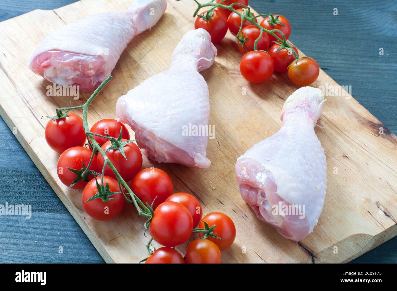 Various fresh meats of chicken and pork with tomatoes Stock Photo