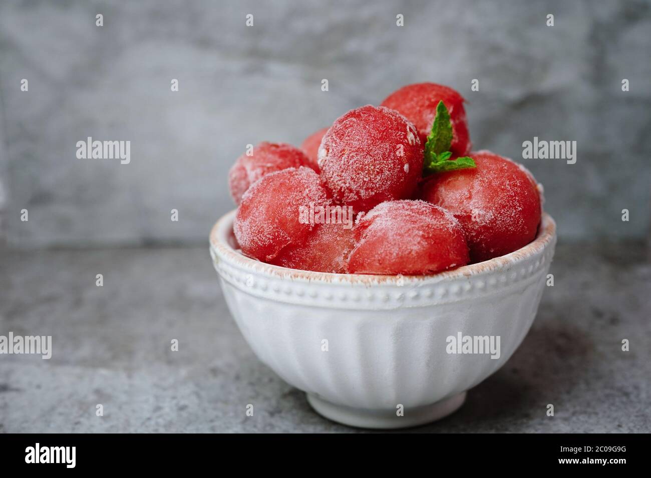 Frozen watermelon Balls in abowl, selective focus Stock Photo