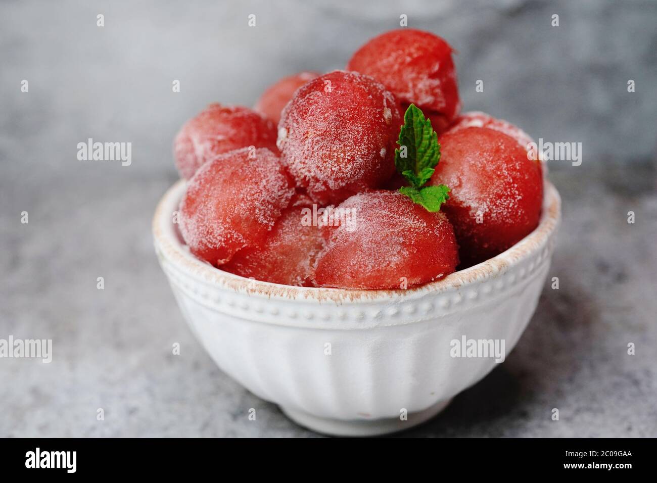 Frozen watermelon Balls in abowl, selective focus Stock Photo