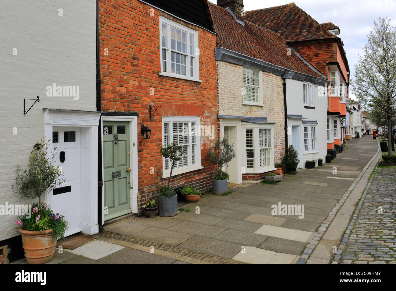 Street view of houses in Faversham town, Kent County; England; UK Stock Photo
