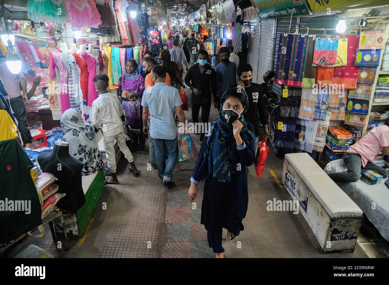18 May 2020 -Shoppers are gathered at the Hasan Market of Sylhet, Bangladesh. The lockdown is slowly easing and more people are being getting out for Stock Photo