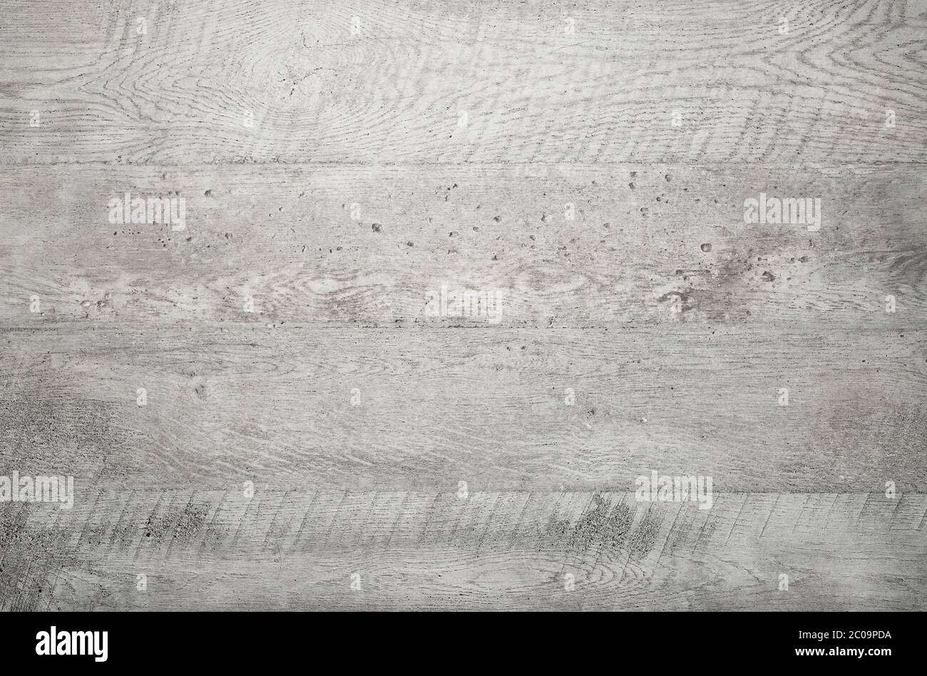 Grey wood texture background viewed from above. The wooden planks are stacked horizontally and have a worn look. This surface would be great as design Stock Photo