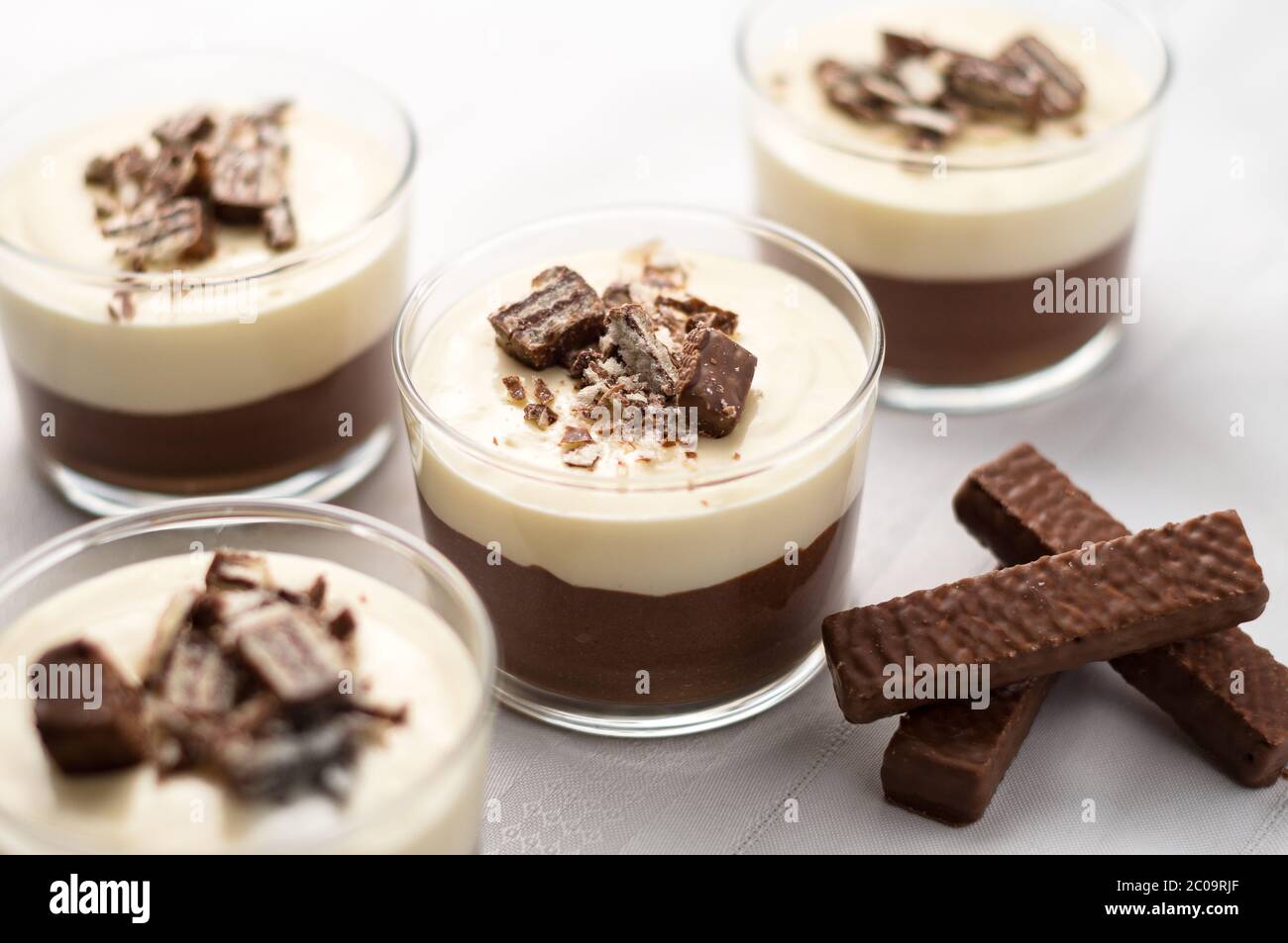 Nobake layered chocolate mousse and cheesecake with chocolate covered