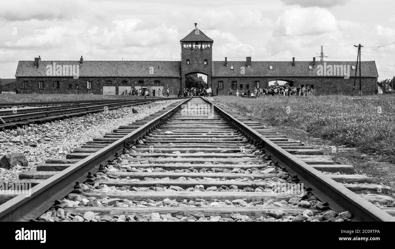 OSWIECIM, POLAND - AUGUST 17, 2014: Main gate to concentration camp in Oswiecim-Brzezinka, Auschwitz-Birkenau, Poland. Stock Photo