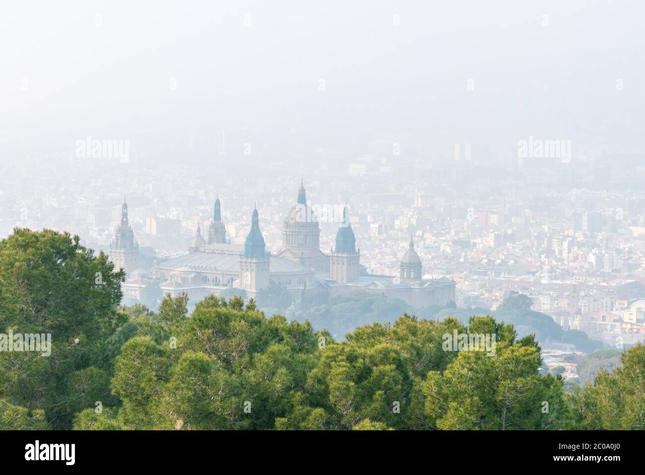 National Art Museum of Catalonia and air polluted view of Barcelona city. Stock Photo