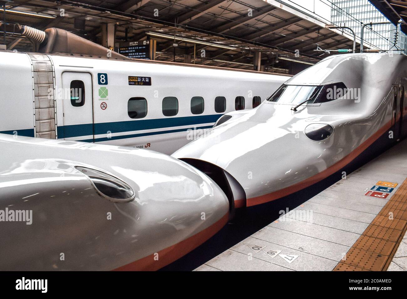 Japanese high speed Shinkansen bullet train waiting on a platform in Osaka station Stock Photo