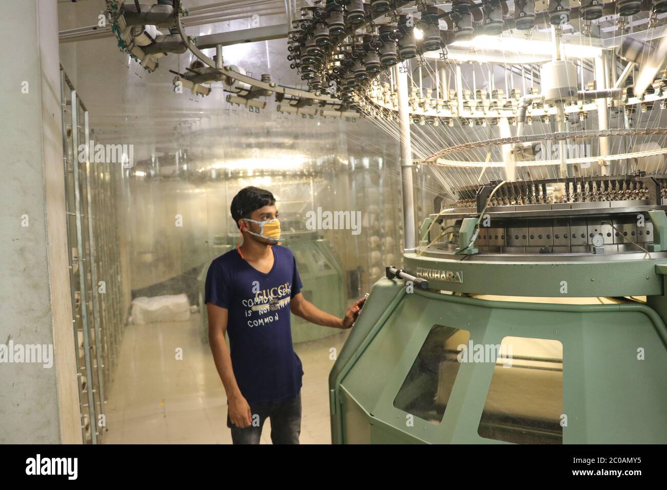 Knitting Machine Operations Industrial interlock circular knitting machine hi-res stock photography ...