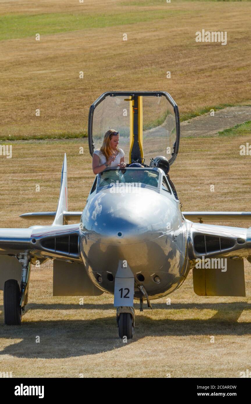 Private owners of de Havilland DH100 Vampire T35 jet plane at Wings over Wairarapa airshow at Hood Aerodrome, Masterton, New Zealand. Privately owned Stock Photo