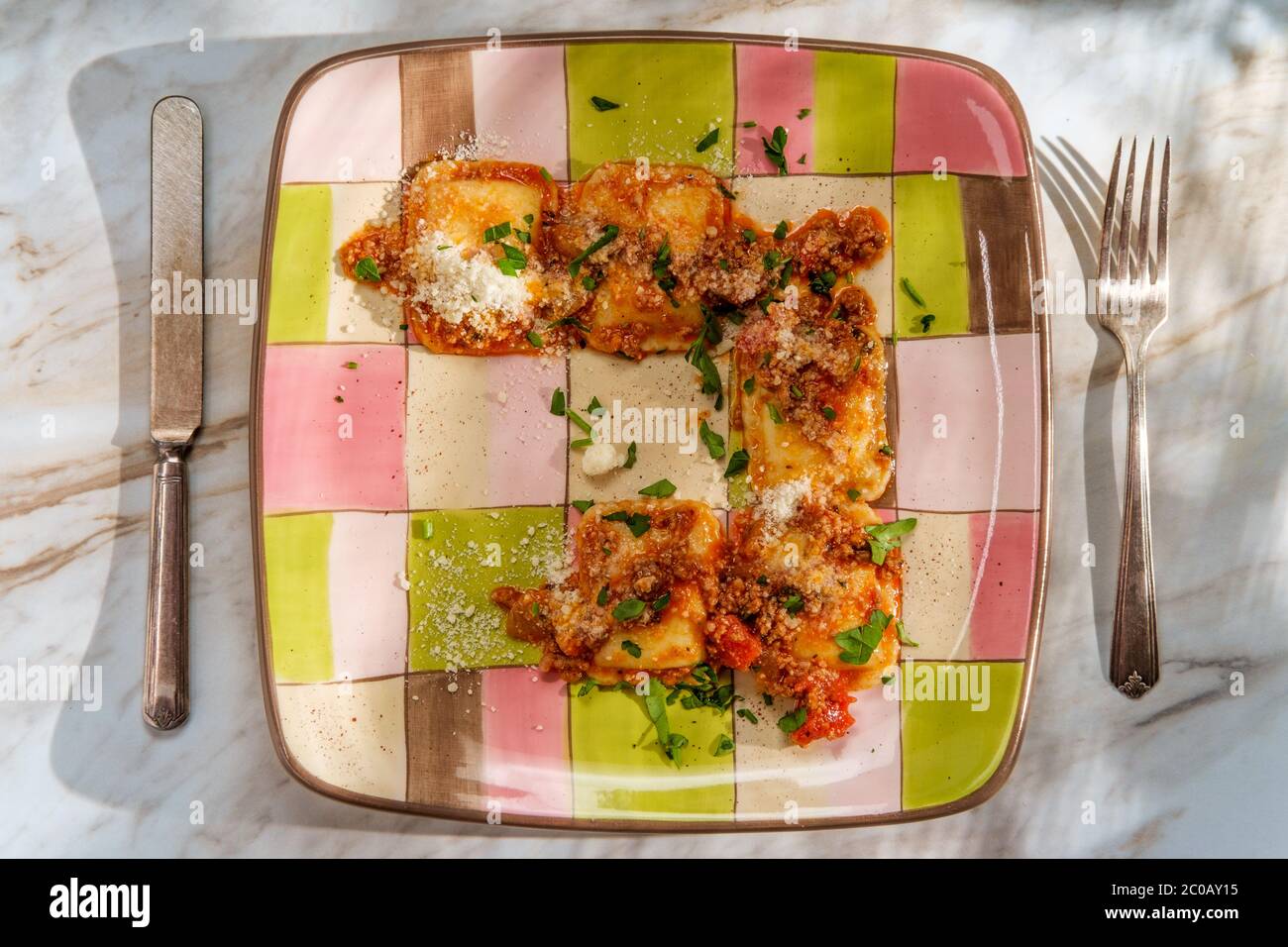 Authentic Italian dinner ravioli ragu alla bolognese Stock Photo Alamy