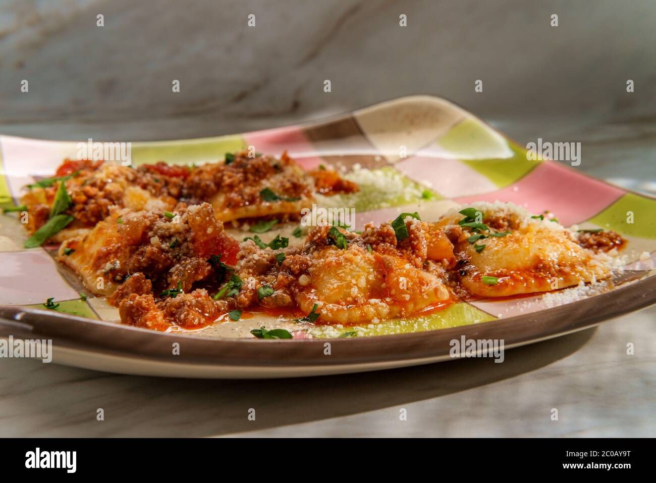 Authentic Italian dinner ravioli ragu alla bolognese Stock Photo Alamy
