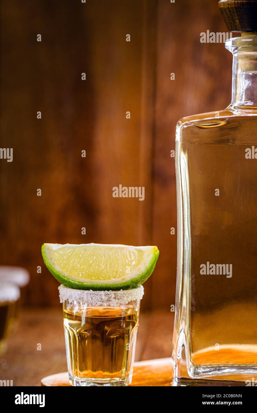 glass and bottle of tequila. typical drink from mexico. International ...