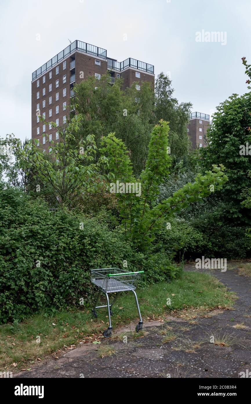 Block of flats in Brierley Hill, West Midlands, UK with a shopping cart or trolley Stock Photo