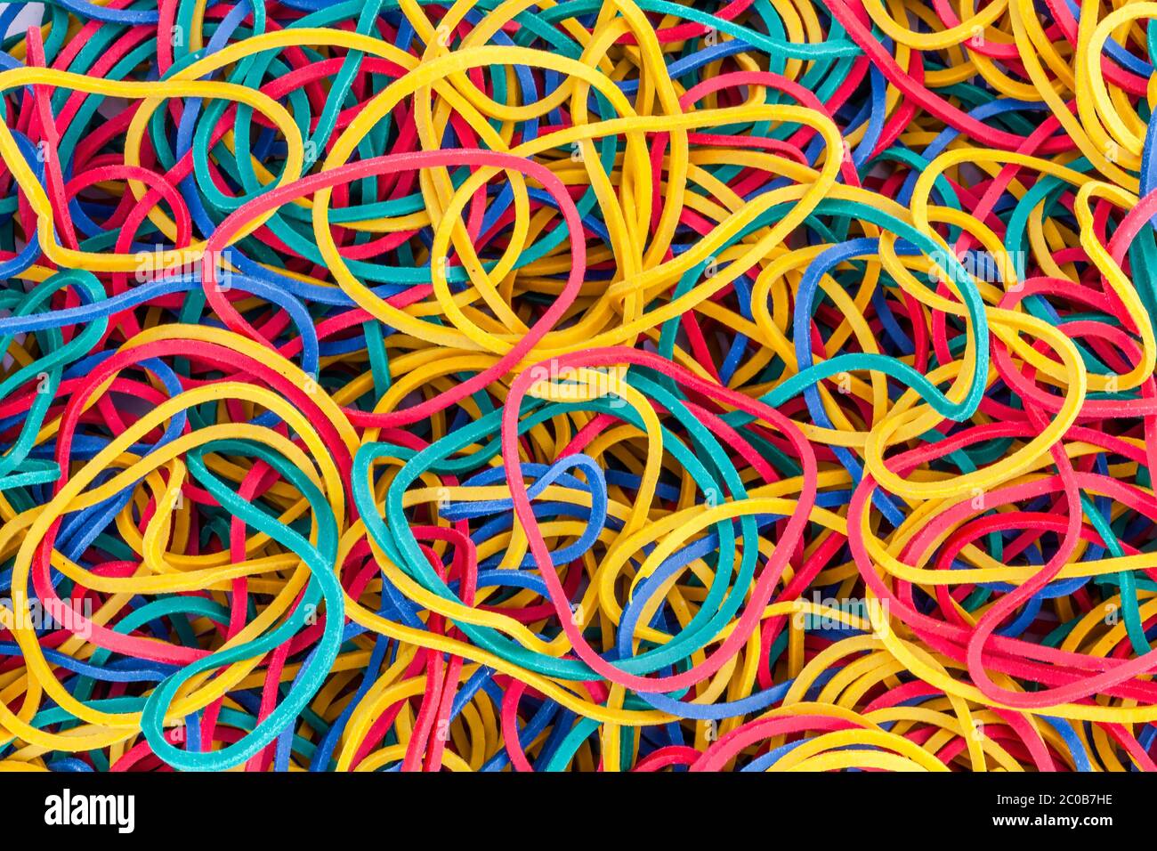 Multicolored bright elastic rubber bands colourful background in a