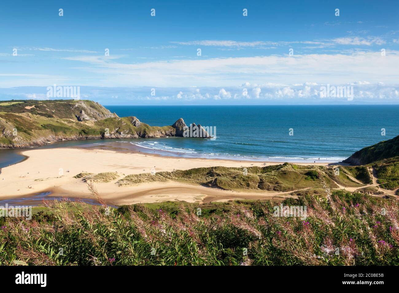 Three Cliffs Bay on the Gower Peninsular West Glamorgan Wales which is a popular Welsh coastline attraction travel destination in the UK Stock Photo
