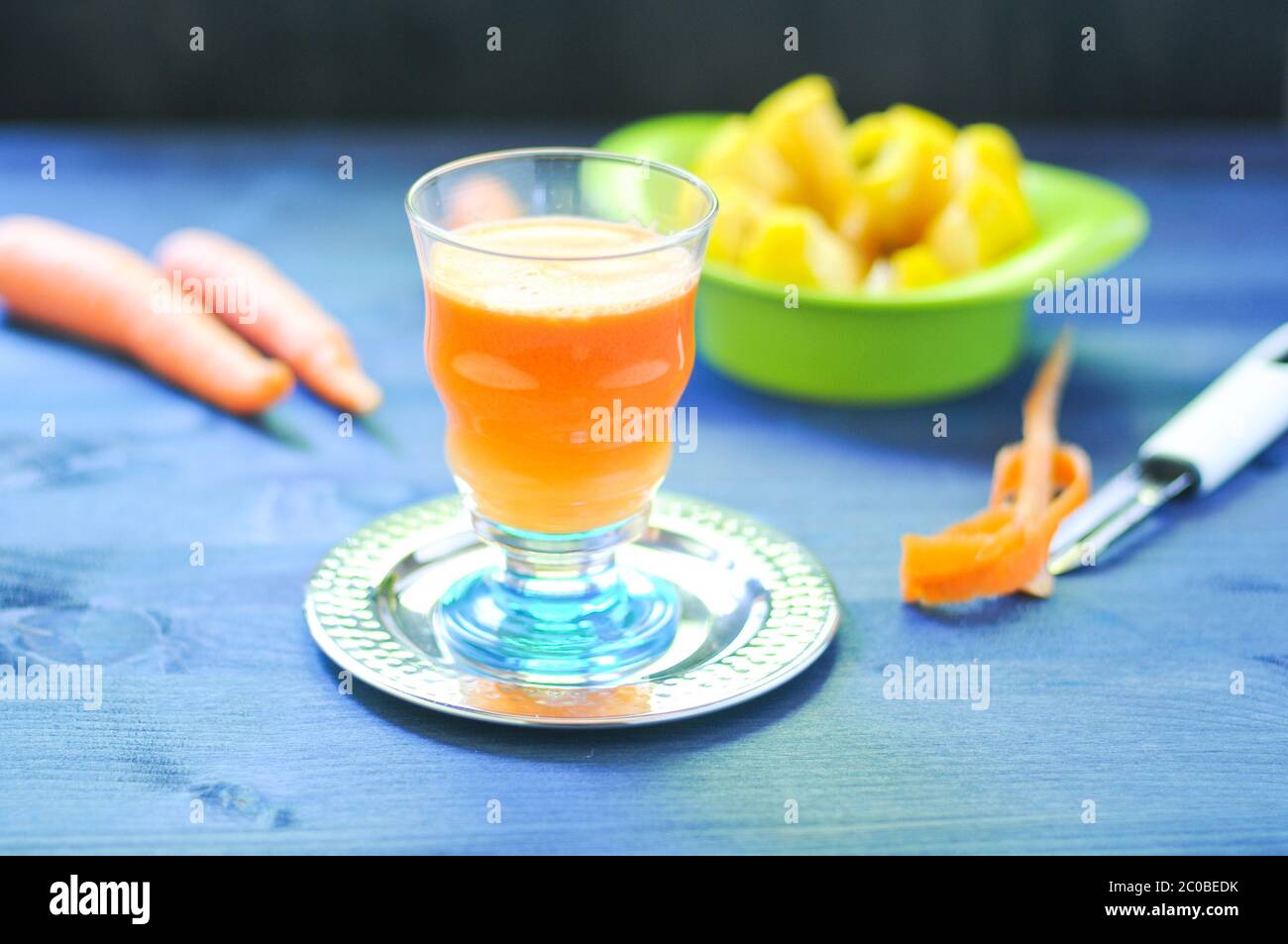 Carrot juice with apple and ginger lemon Stock Photo Alamy