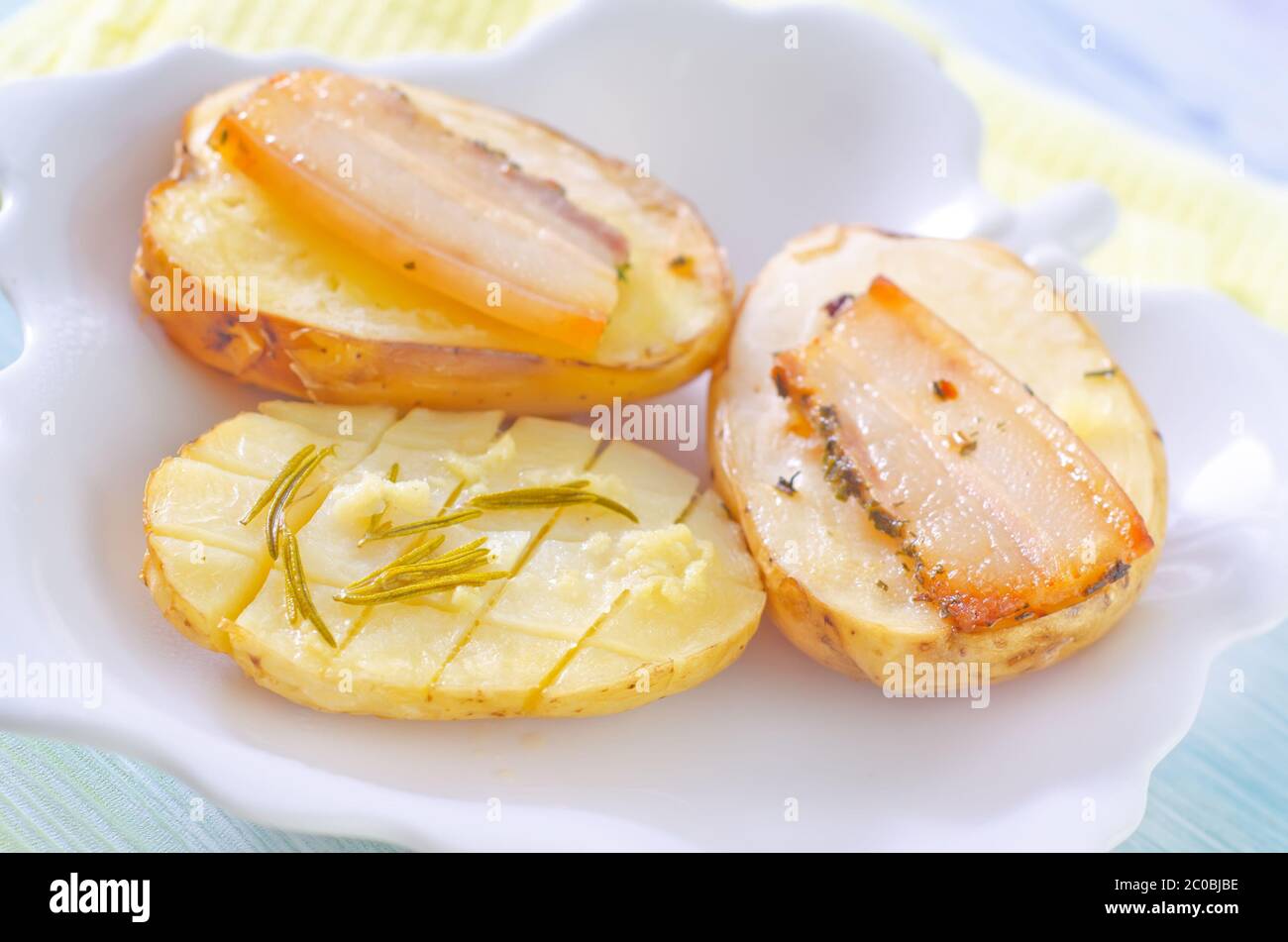 baked potato with lard Stock Photo Alamy