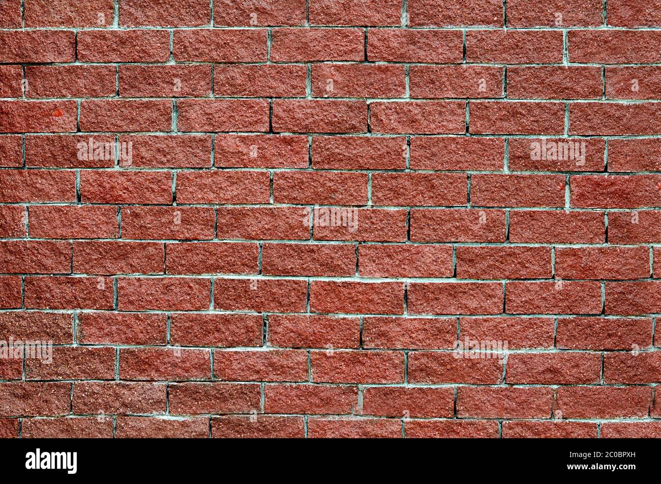 Wall from red brick close up Stock Photo
