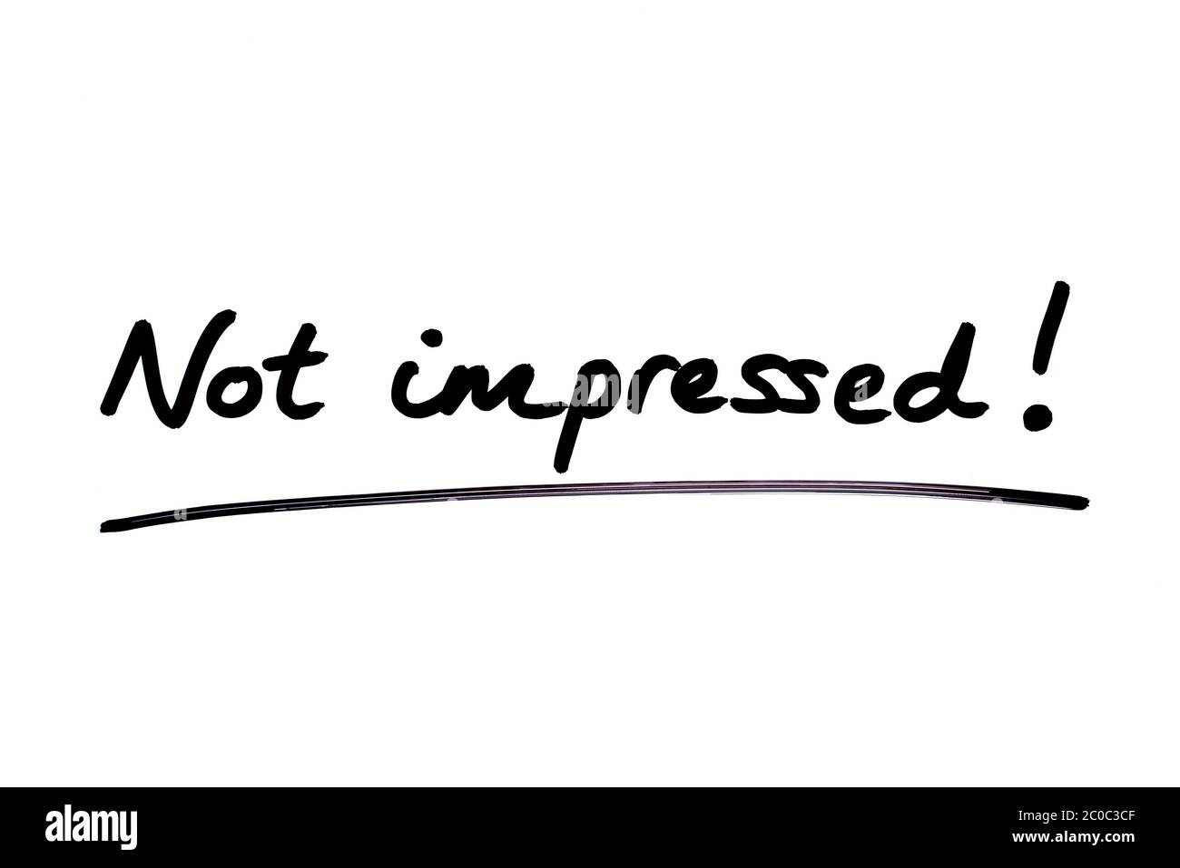 Not impressed! handwritten on a white background. Stock Photo