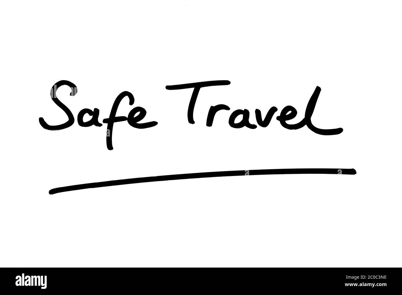 Safe Travel handwritten on a white background. Stock Photo