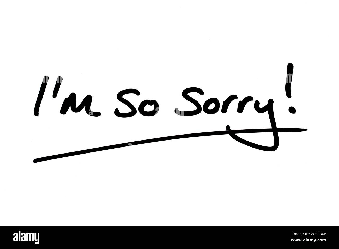 I’m so sorry! handwritten on a white background. Stock Photo