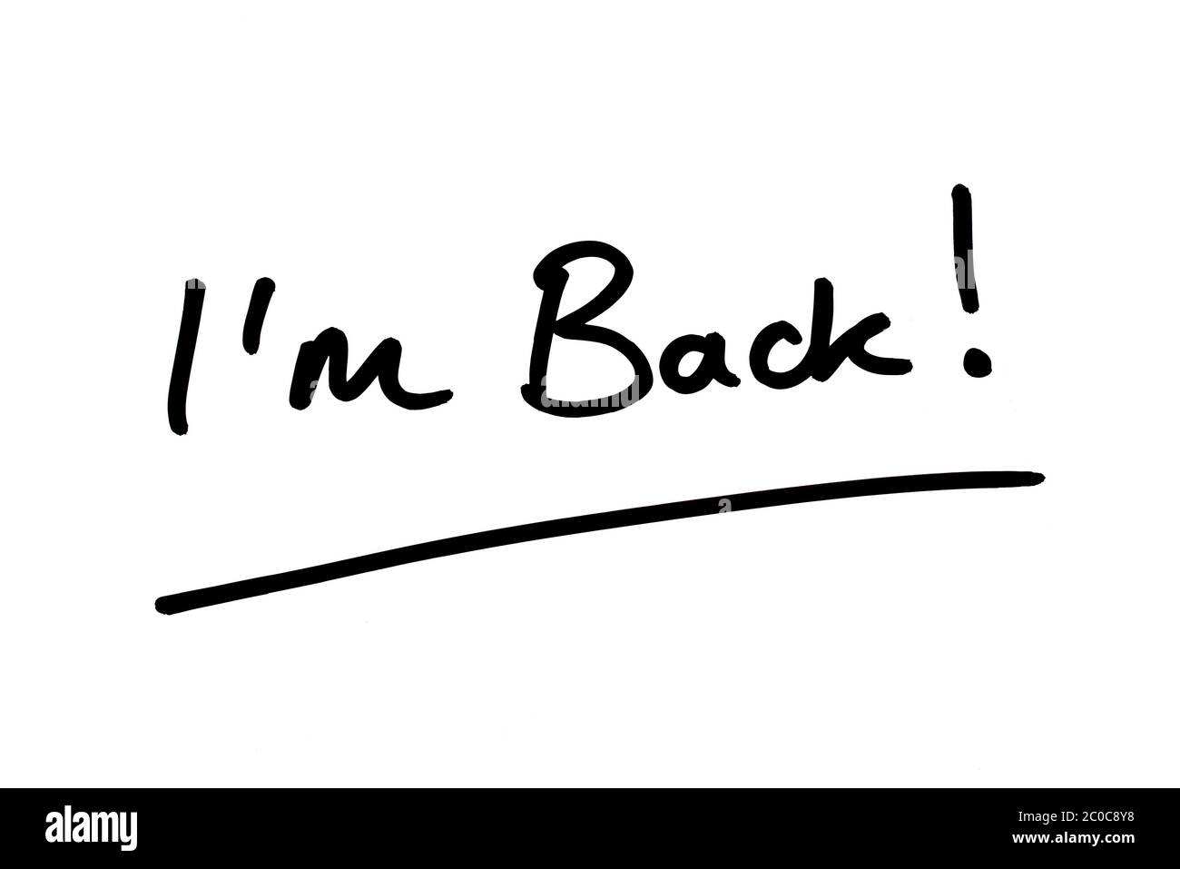 Im Back! handwritten on a white background. Stock Photo