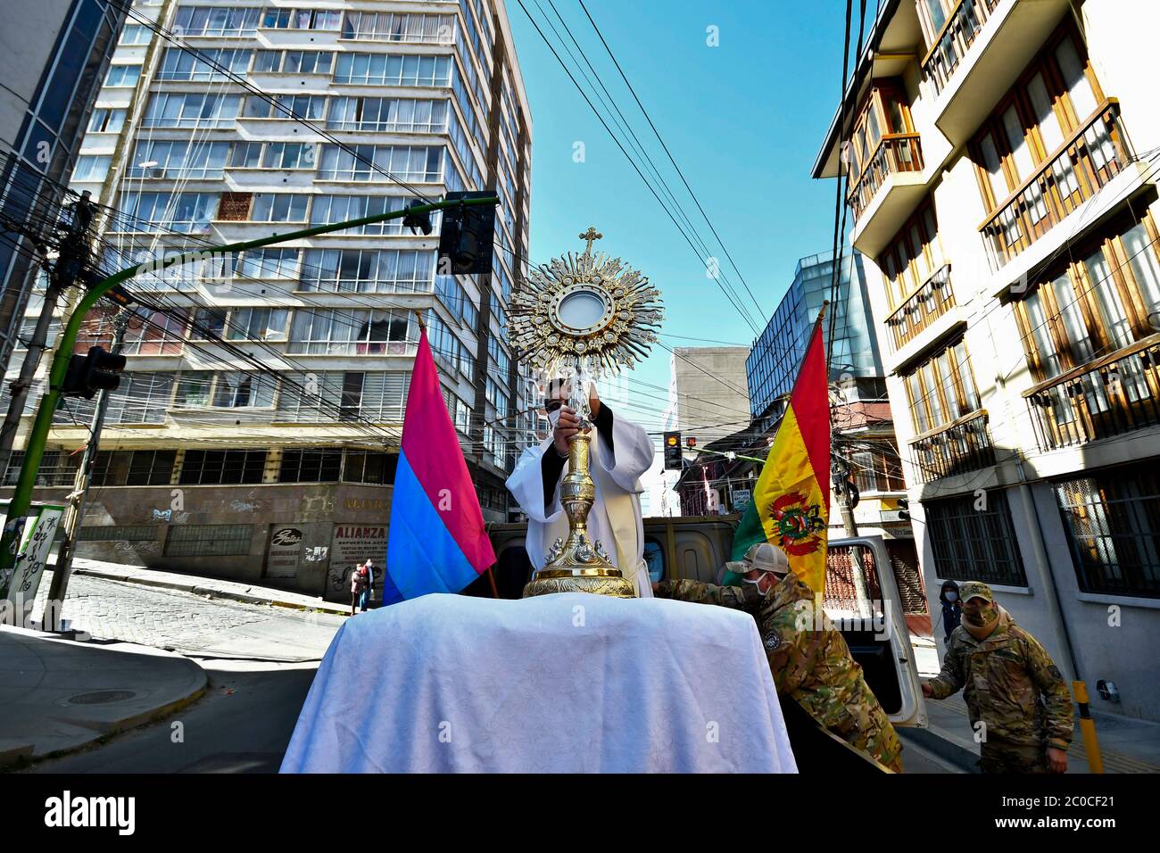 June 11, 2020, La Paz, LA PAZ, Bolivia: Corpus Christi procession in La Paz,  Bolivia, have been summarized to a group of priests with an ostentation  traveled through the streets of La