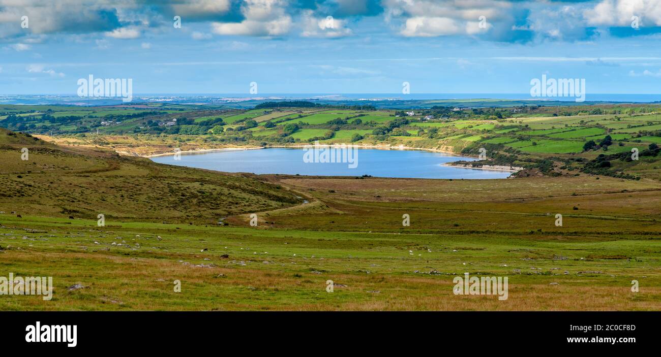 The Stannon Lake on Bodmin Moor in Cornwall was creeated by the flooding of a decommissioned china clay extraction quarry Pit and is now used as raw w Stock Photo