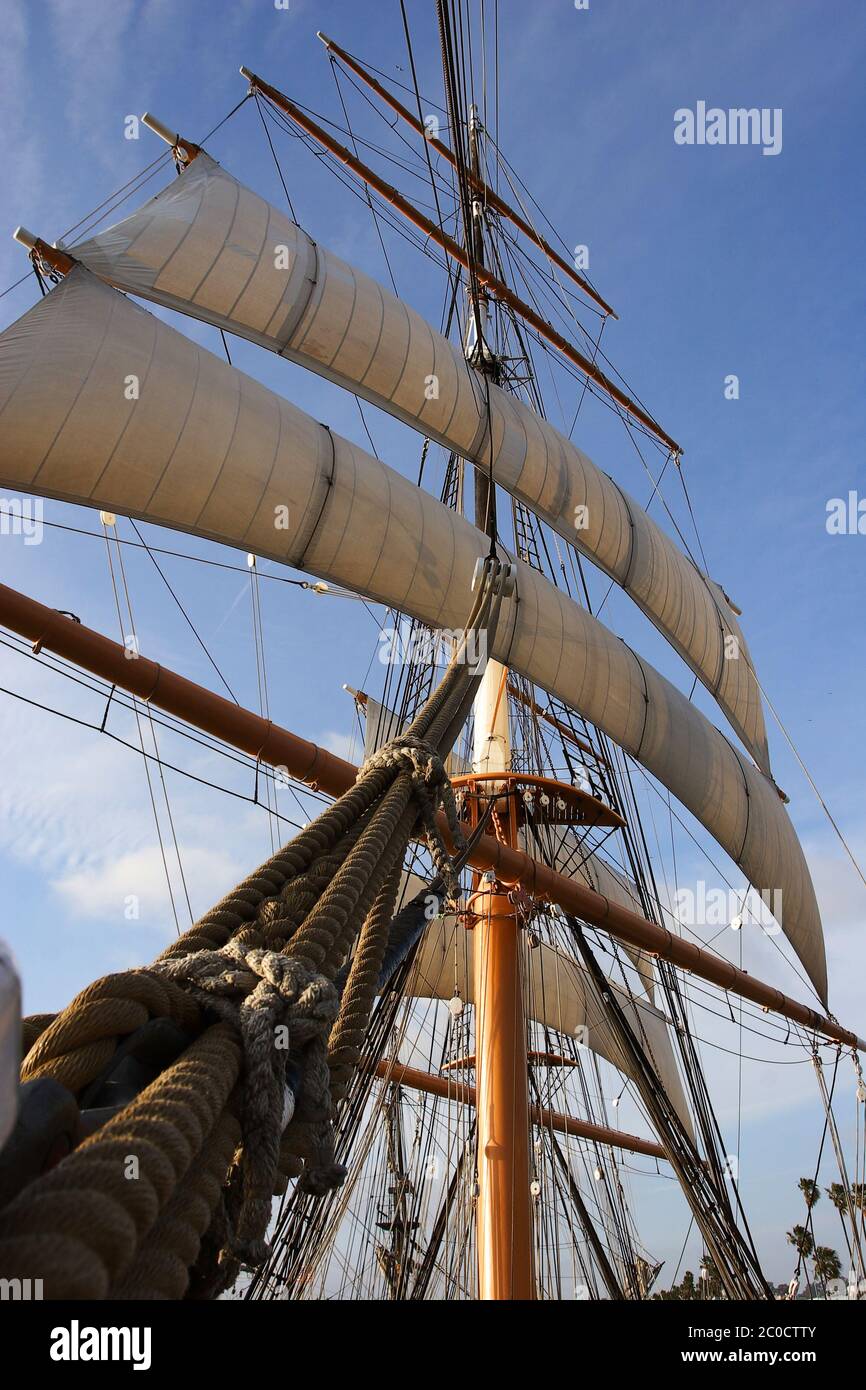 Mast with sails of a tall ship with square rigging, view from below Stock Photo