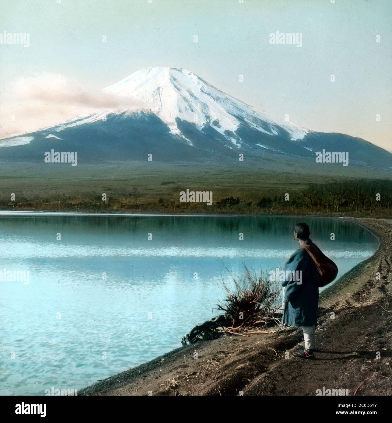 [ 1900s Japan - Mount Fuji ] — A view of a snowcapped Mount Fuji as seen from Lake Yamanaka in Yamanashi Prefecture.  20th century vintage glass slide. Stock Photo