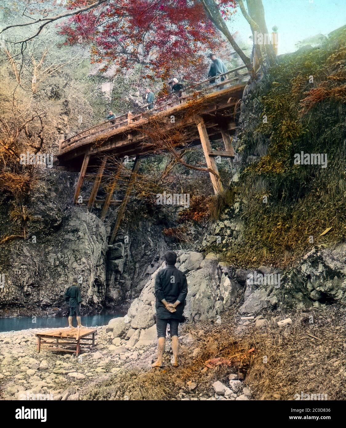 [ 1900s Japan - Kyoto in Autumn ] — Visitors enjoy the autumn colors of Japanese maple trees at Takao ((高雄), one of Kyoto’s three most famous mountain ridges.  20th century vintage glass slide. Stock Photo