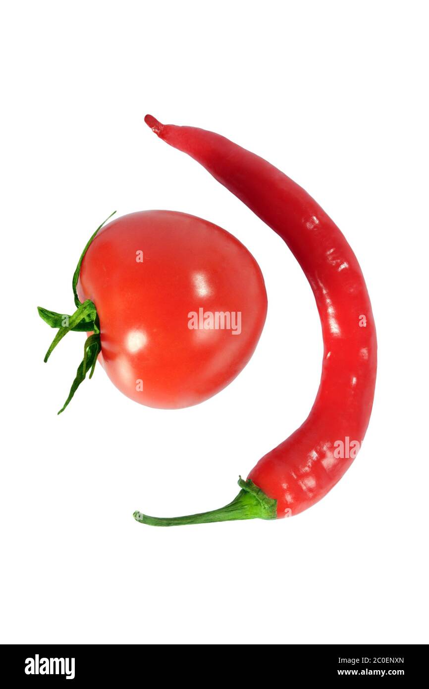 Tomato and red Chili pepper on white background Stock Photo - Alamy