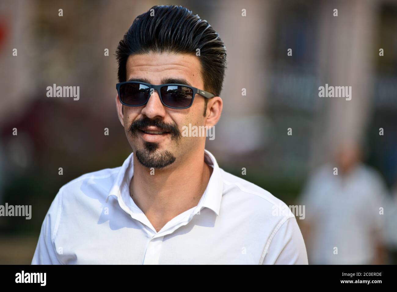 Armenian man wearing sunglasses in Northern Avenue, Yerevan, Armenia Stock Photo