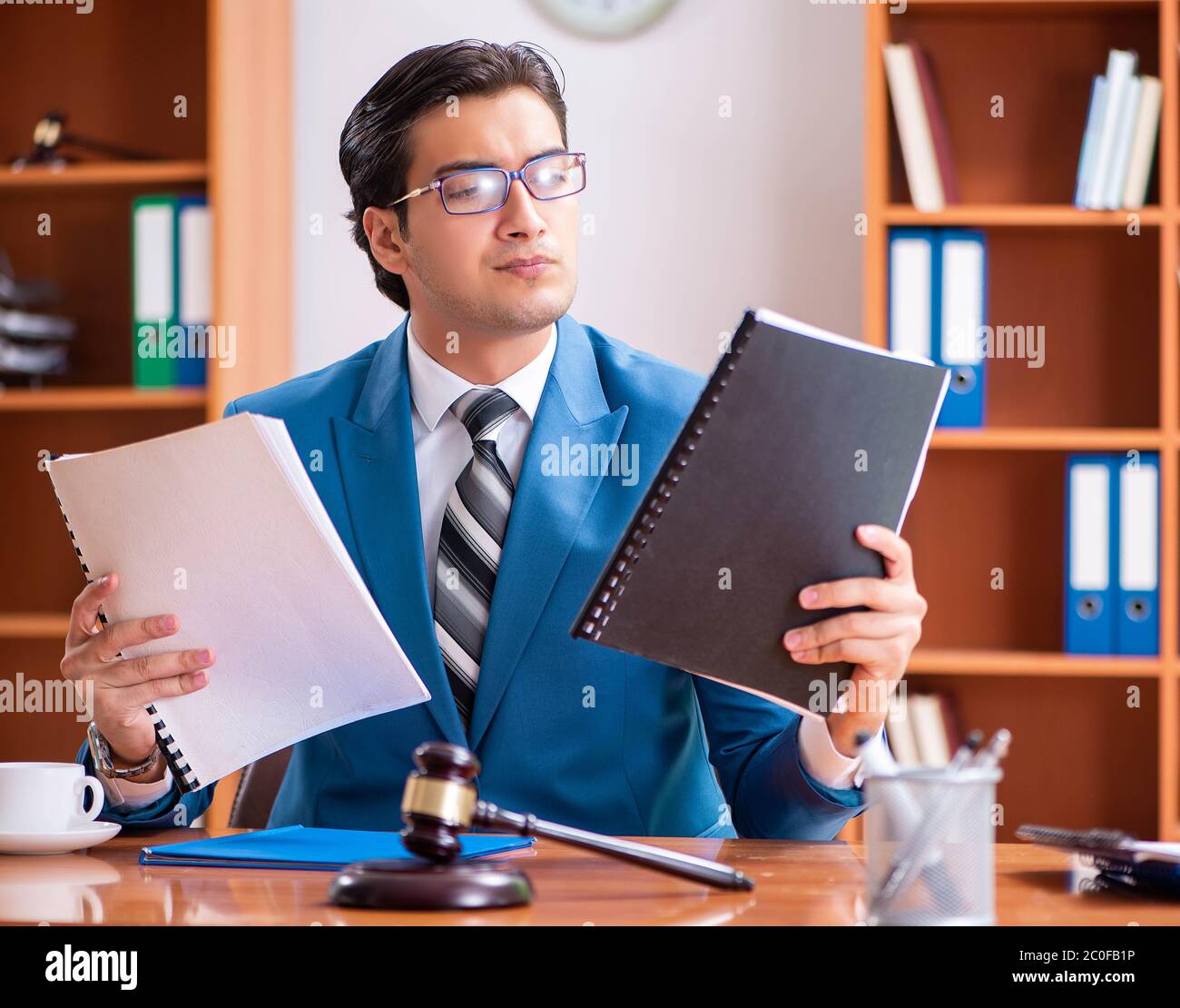 The lawyer working in the office Stock Photo - Alamy