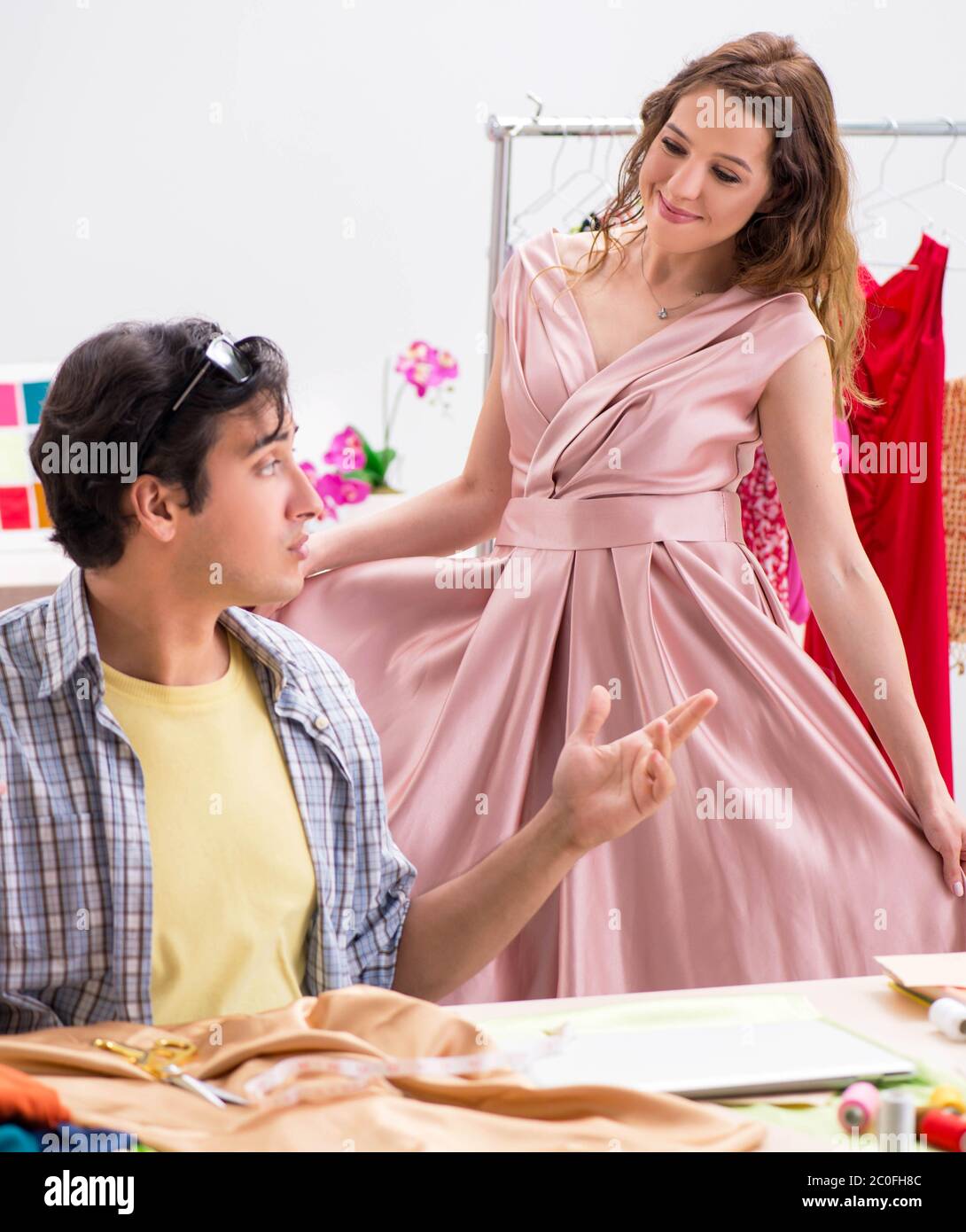 The young tailor working in his workshop Stock Photo - Alamy