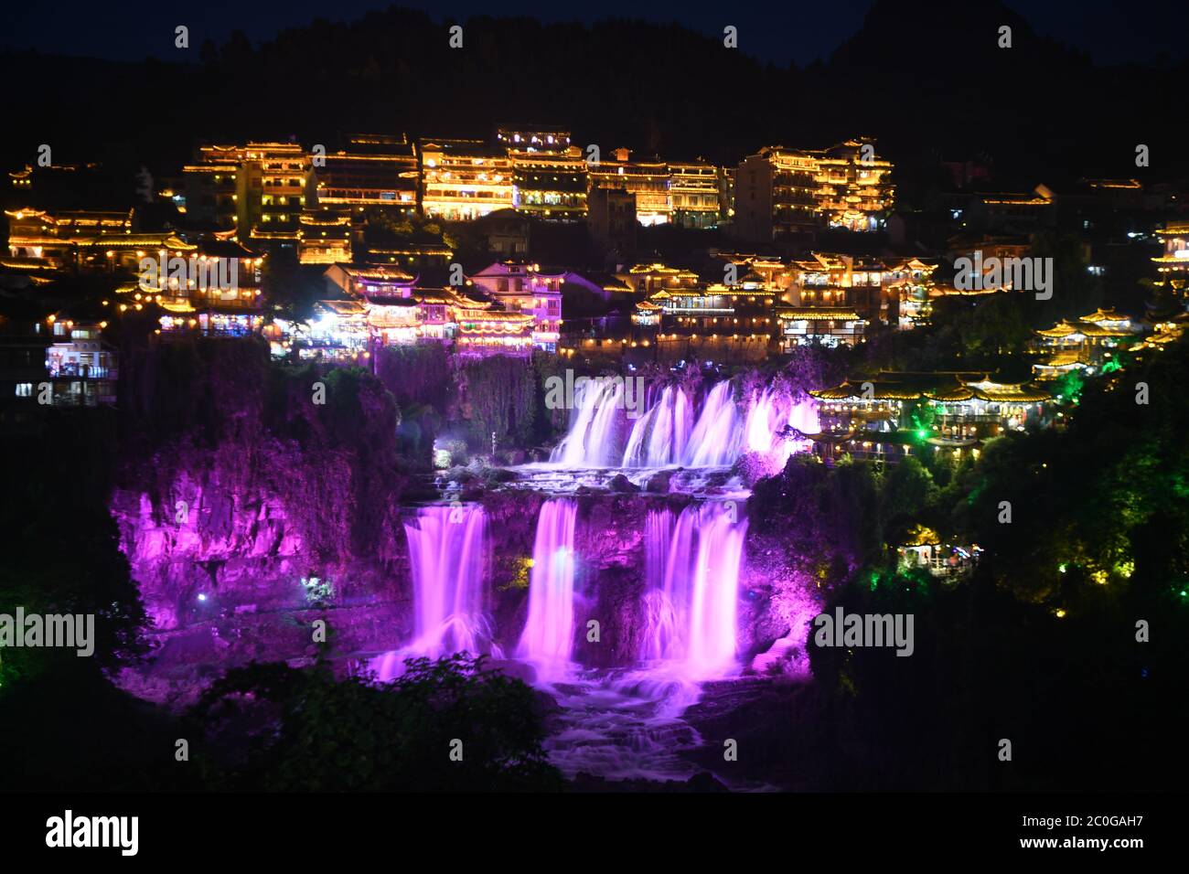 Beijing, China. 11th June, 2020. Photo taken on June 11, 2020 shows a night view of the Furong Town scenic spot in Xiangxi Tu and Miao Autonomous Prefecture, central China's Hunan Province. Credit: Xue Yuge/Xinhua/Alamy Live News Stock Photo