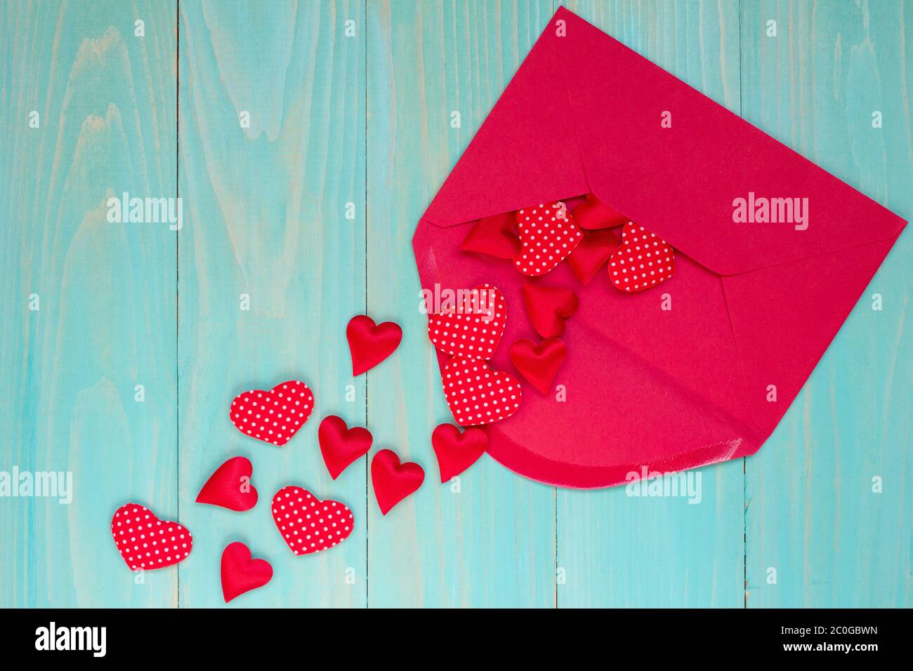 Envelope with  hearts on blue background Stock Photo