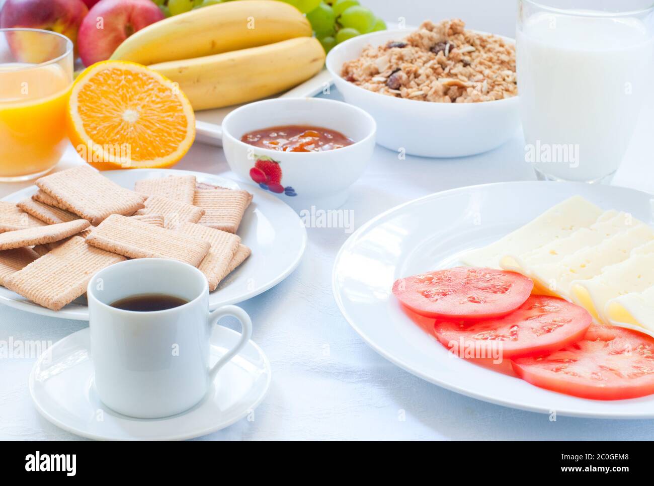 Continental breakfast with fruit , coffee , cheese , vegetables Stock