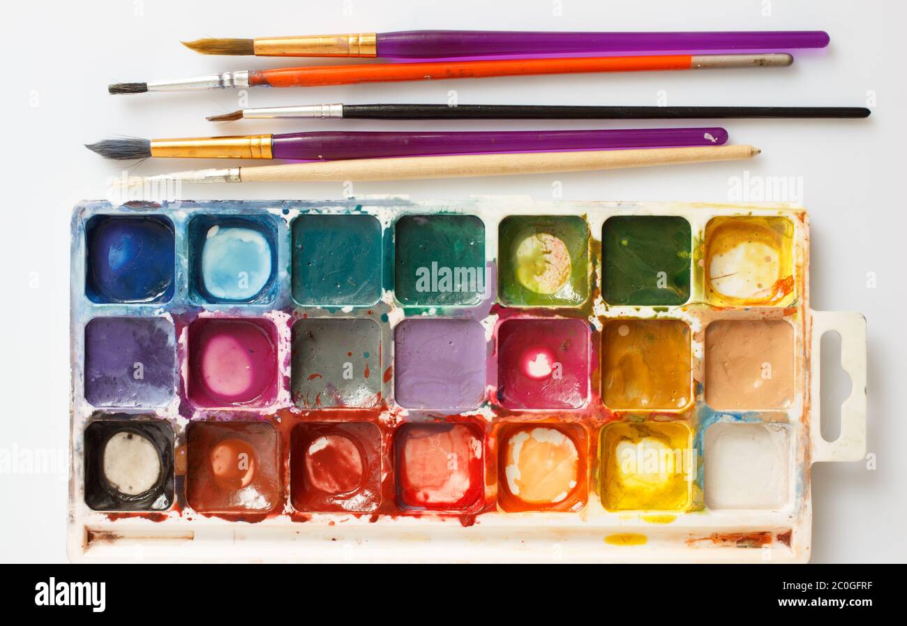 Box of paints and paint brushes Stock Photo Alamy