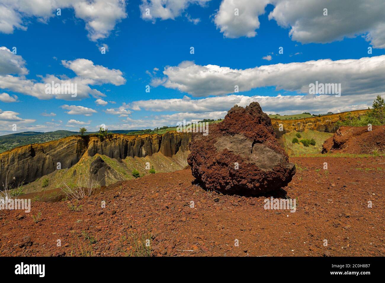 Vulcan Racos View of volcanic crater in Racos village, Brasov county, Romania Stock ...