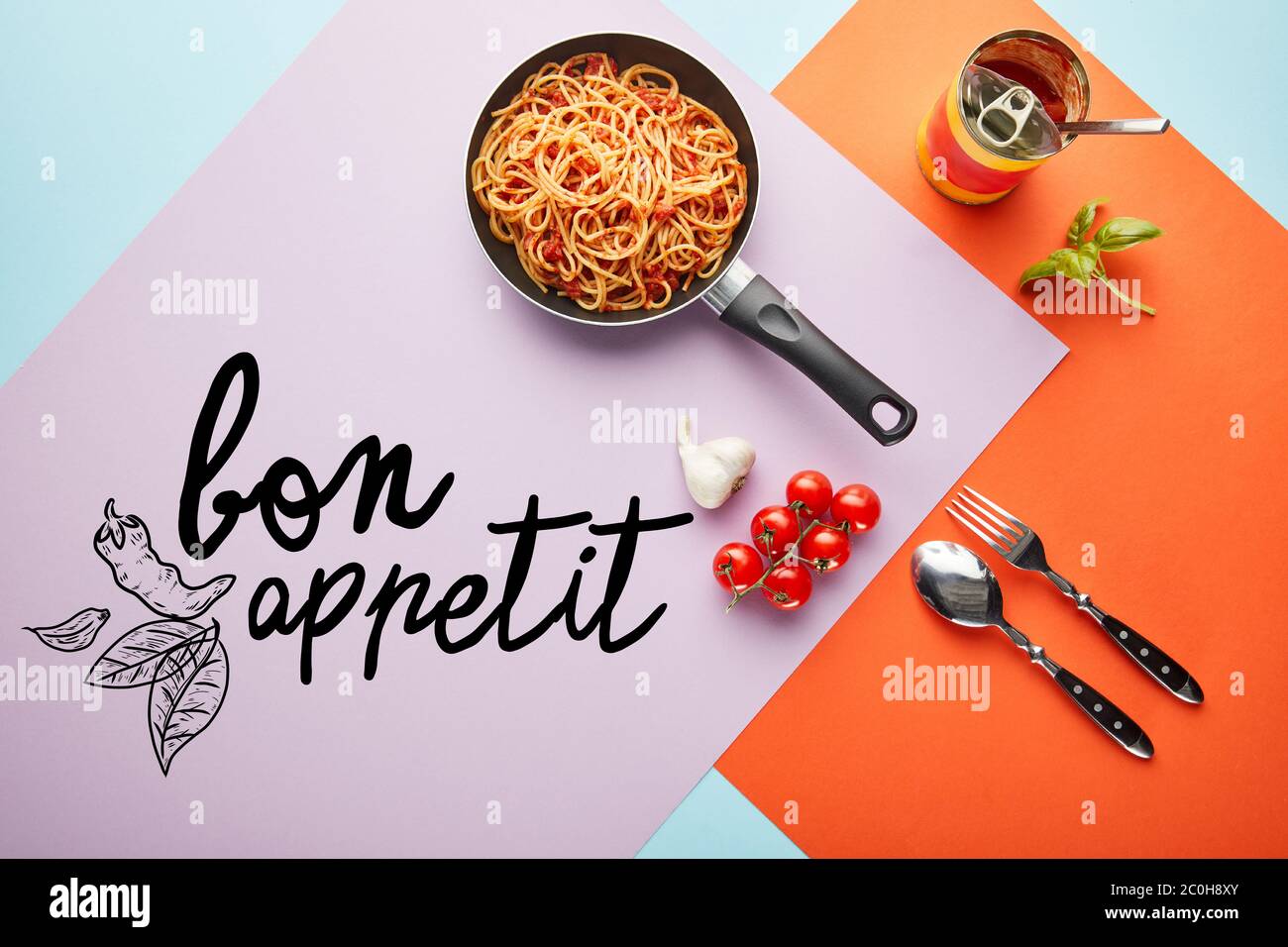 flat lay with delicious spaghetti with tomato sauce in frying pan near
