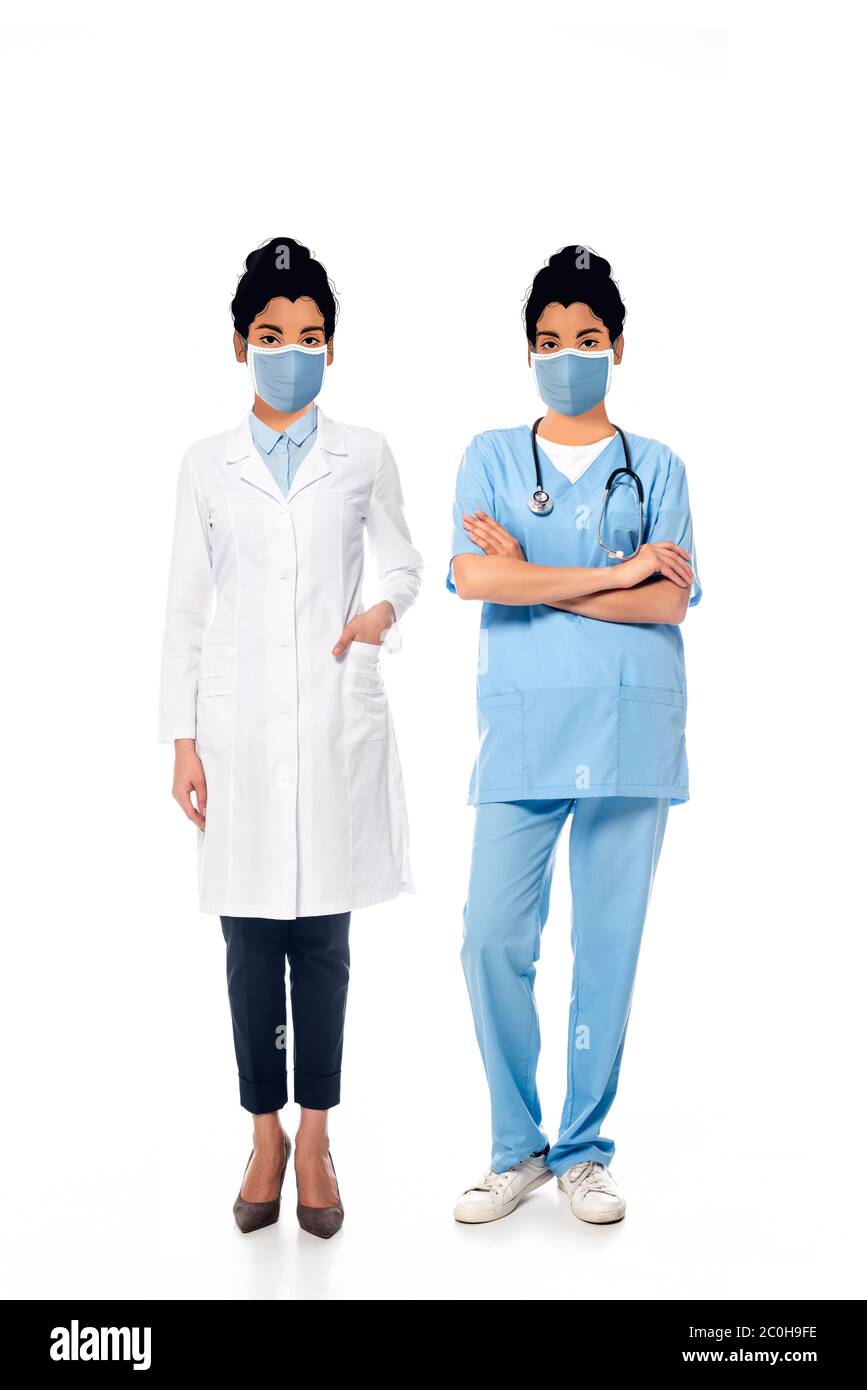 african american nurse and doctor with illustrated faces in medical masks on white Stock Photo