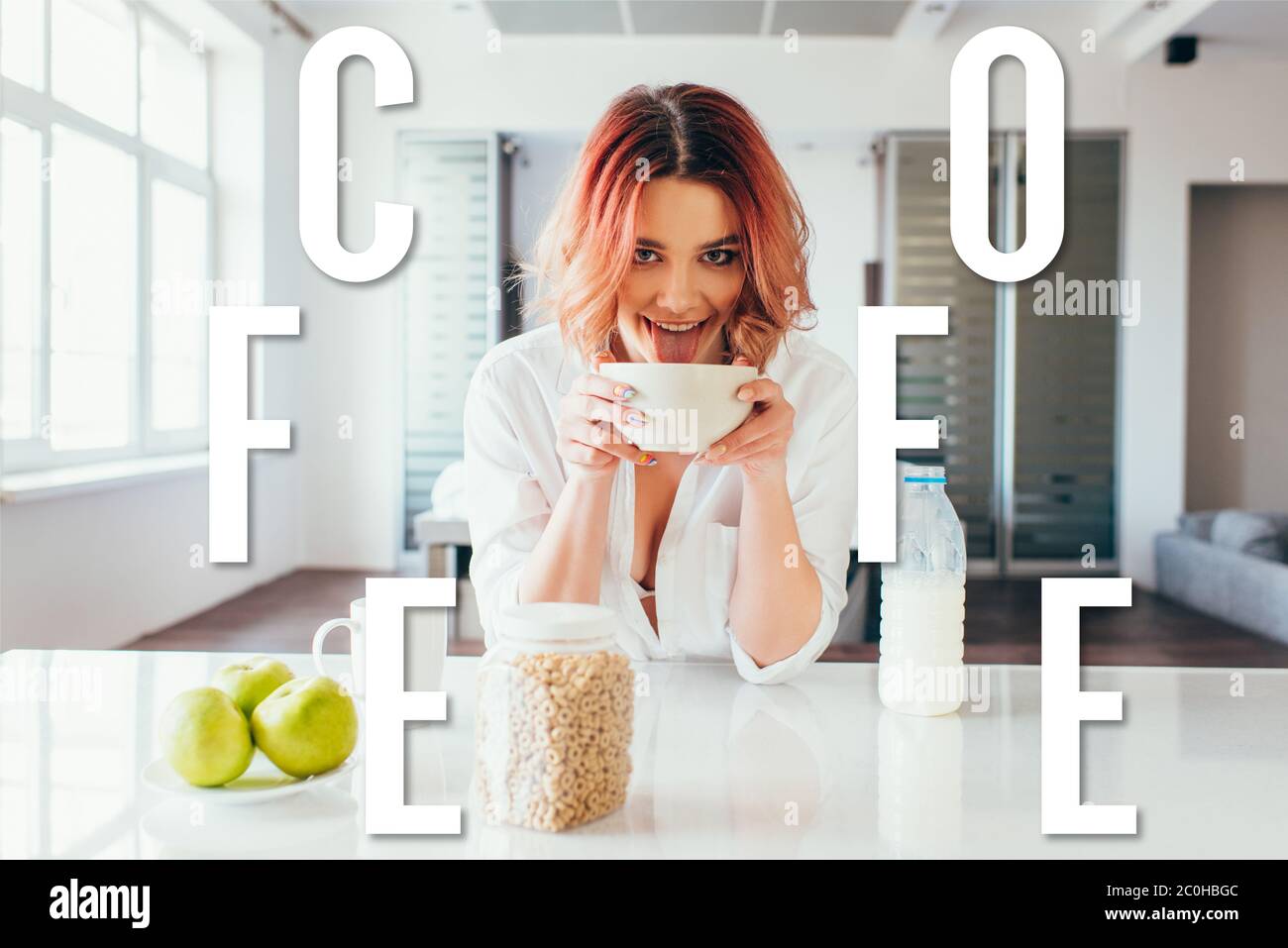 funny girl licking cornflakes with milk for breakfast during quarantine with coffee lettering Stock Photo