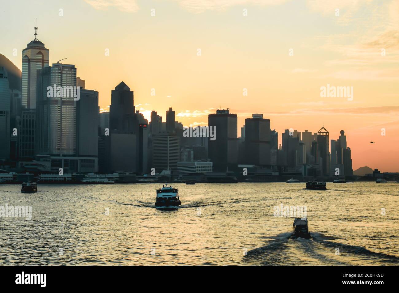 Beautiful orange sunset over the Hong Kong skyline Stock Photo - Alamy