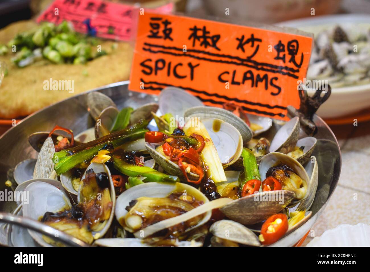 Hot pot with spicy clams sold on a street market in Hong Kong China Stock Photo